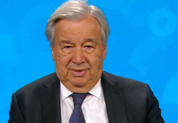 The UN Secretary-General delivering a video message.