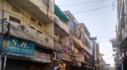 Shopkeepers have shuttered their stores in old Delhi, India following the government's announcement of a nationwide lockdown for 21 days to stem the spread of COVID-19.