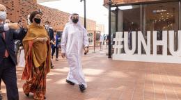 The Deputy Secretary-General Amina Mohammed walks outside the EXPO facilities with other officials.