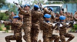 Mongolian peacekeepers serving in a guard unit assigned to protect the Special Court for Sierra Leone perform a tactical exercise.