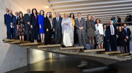 A group of people stand on a cascading staircase in Brasilia