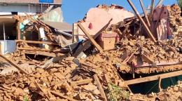 A house that was destroyed in an earthquake lays in pieces in western Nepal.