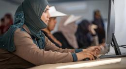 A woman in Jordan uses a computer.