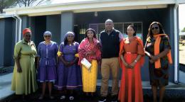 High-level UN officials and national partners in Lesotho pose for a photo together.
