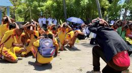 Students in Timor-Leste practice during a tsunami drill.