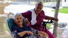 An elderly woman and her caretaker in the Dominican Republic.
