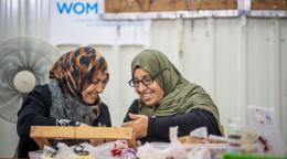 Two women in Jordan at a vocational training workshop.