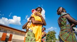 A woman in the Central African Republic holds her baby.