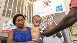 A child in Uganda receives malnutrition support.
