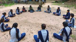 UN Volunteers in India sit in a circle.