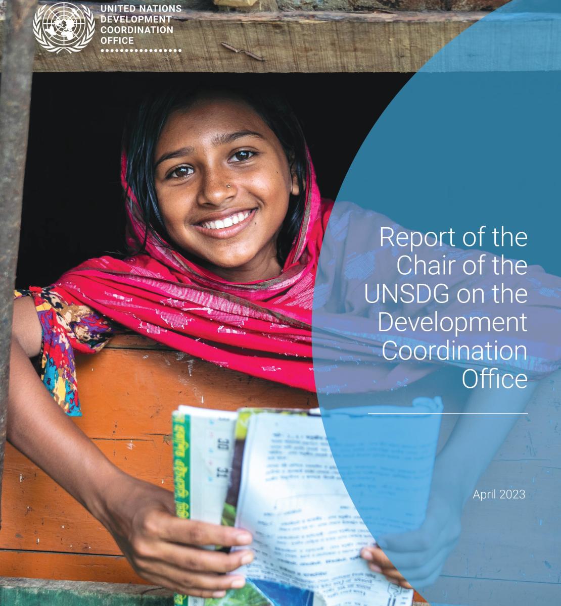 Girl in pink dress holding a report and looking through a window