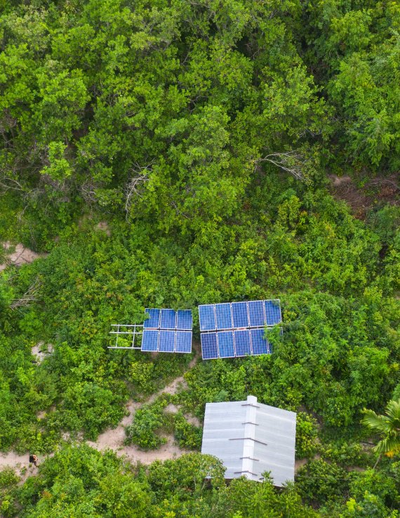 A solar panel in a Cambodian forest.