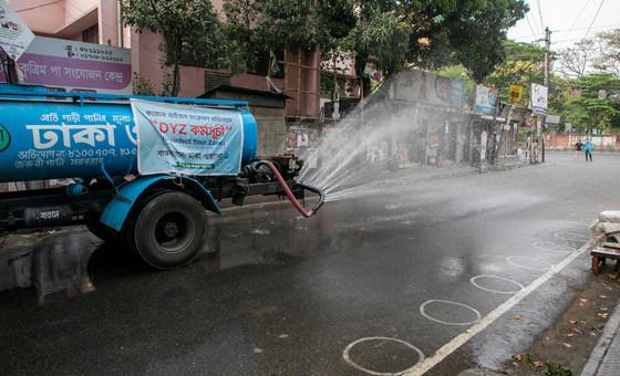 A municipal truck sanitizes the streets of Dhaka, Bangladesh in order to prevent COVID-19.