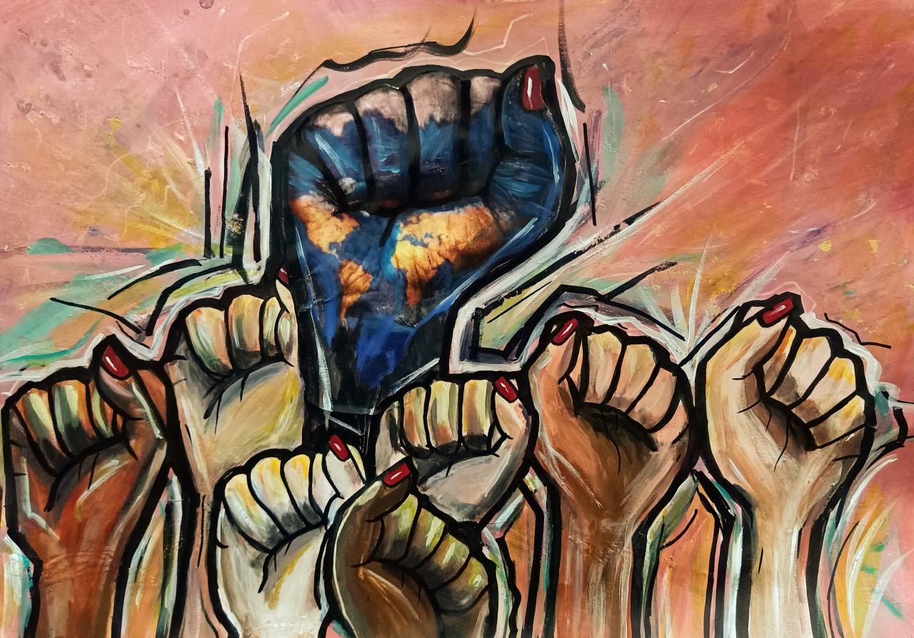 Obra de arte de puños pintados de diferentes tamaños y colores, levantados hacia arriba, en señal de solidaridad.