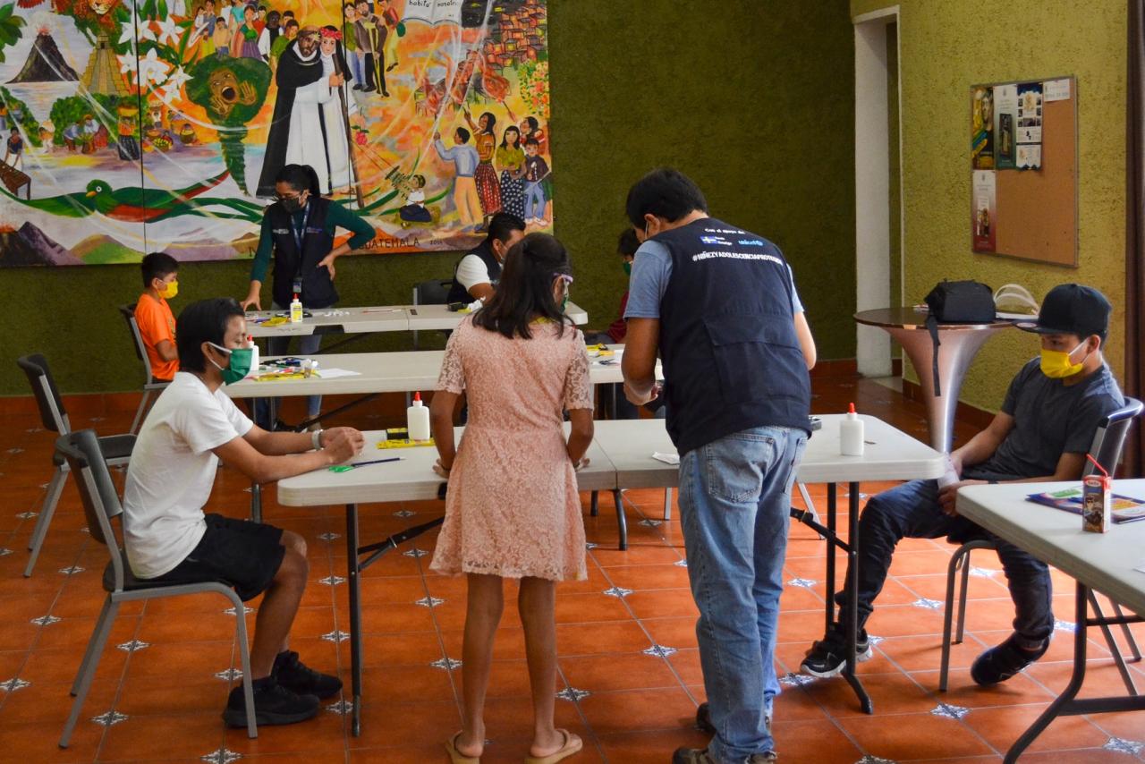 Photo shows a UNICEF-supported centre with young people who receive accommodation and services..