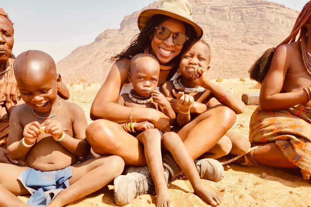Tashia Kalondo visits a Himba tribe settlement at a conservancy in northern Namibia.