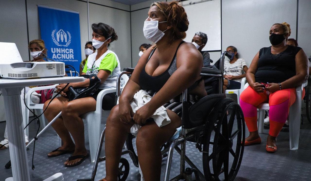 Disabled Venezuelan women refugees and migrants take a job training course with the “Empowering Women Refugees” project in northern Brazil.