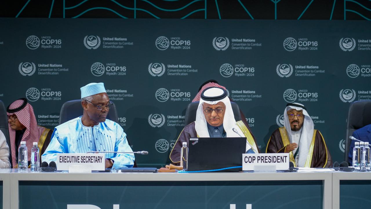 Under-Secretary-General and Executive Secretary of the United Nations Convention to Combat Desertification (UNCCD) Ibrahim Thiaw alongside UNCCD COP16 President at the opening of the COP