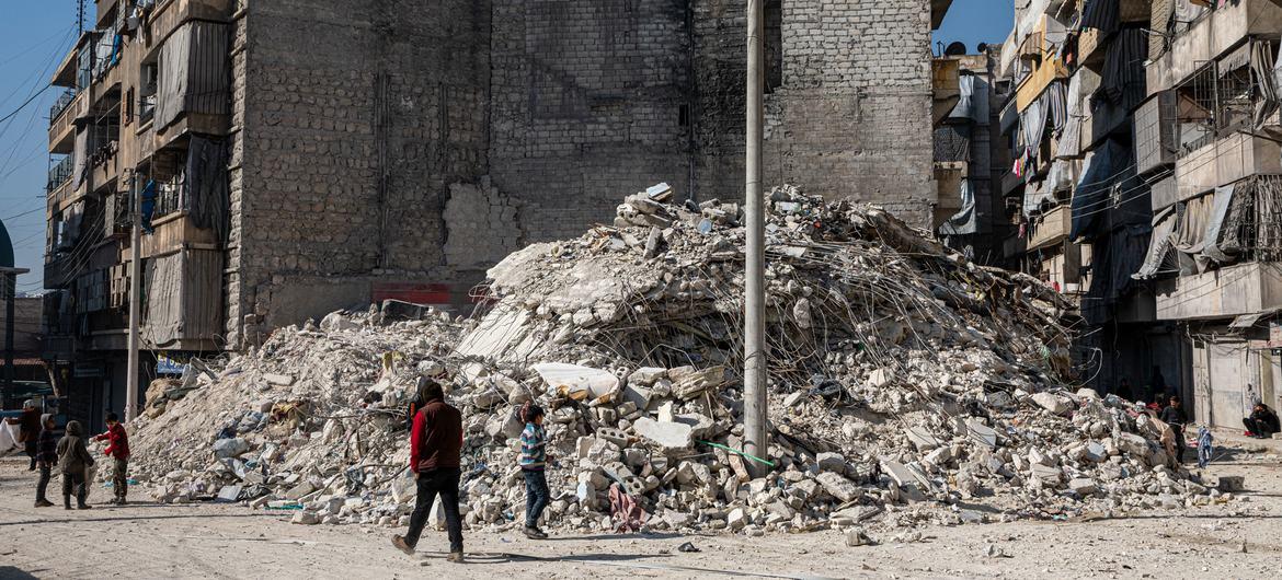 Building broken down to rubble due to earthquake in Syria