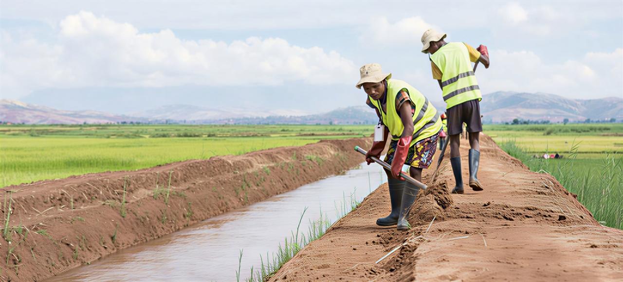 Men work on the Ambondromisotra drain in Madagascar.