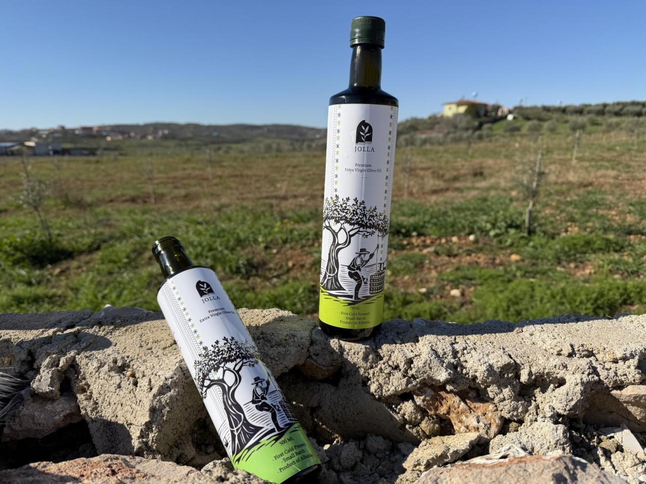 Two bottles of olive oil.