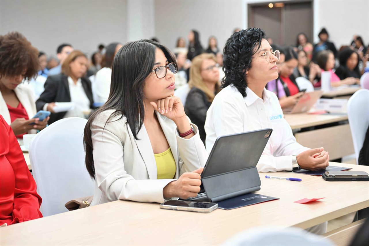 A young woman in the Dominican Republic participates in a conference.