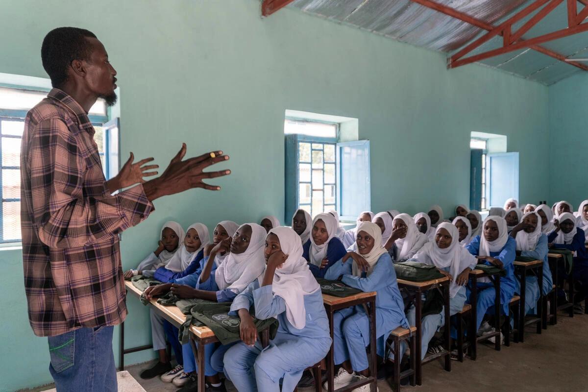 A teacher in Sudan delivers a lesson.