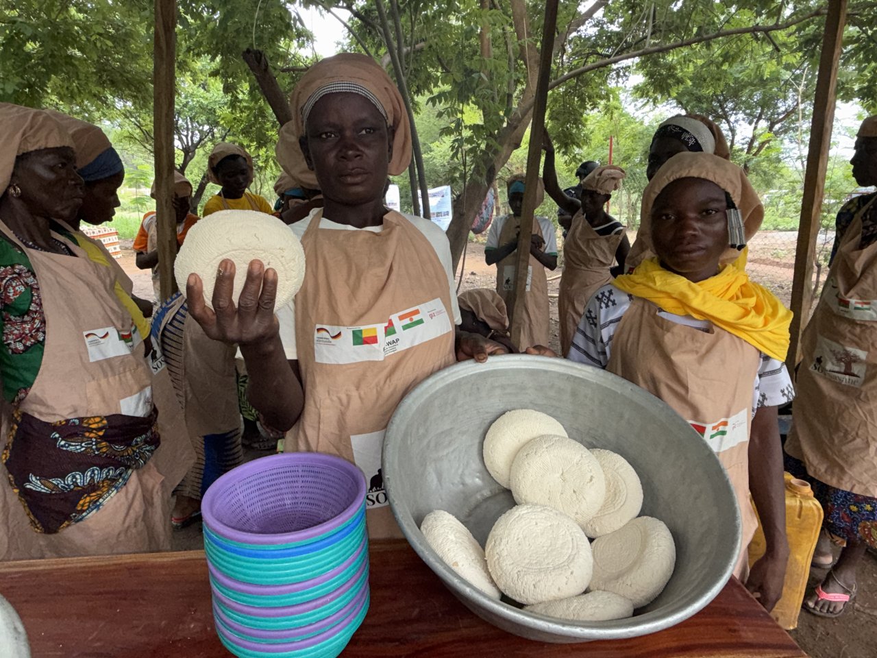 Women in Benin sell food.