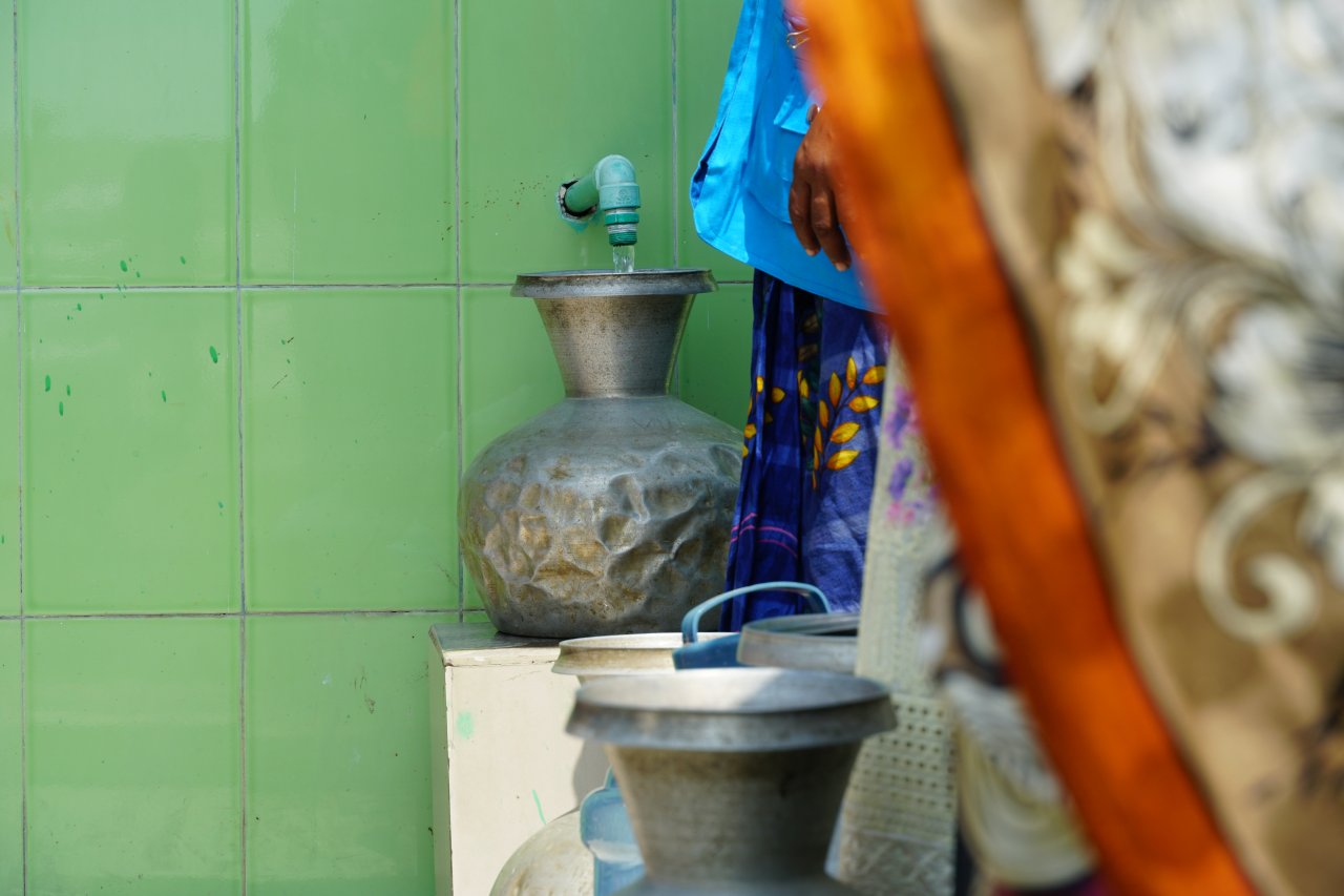 A pitcher of water gets filled in Bangladesh.