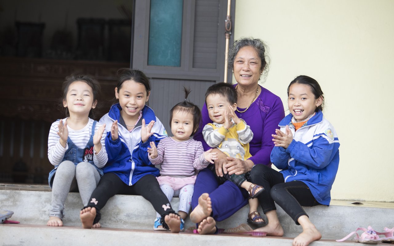 A grandmother and her five grandchildren in Viet Nam.