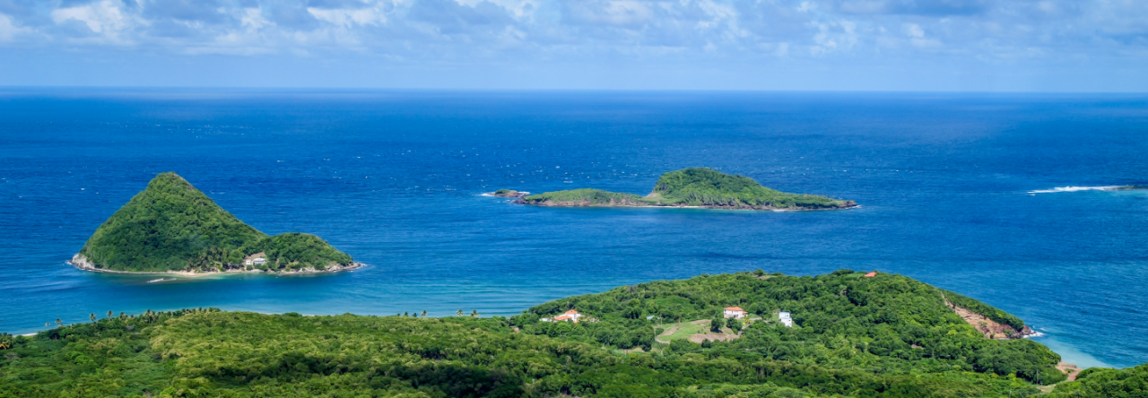 The beautiful blue ocean from a viewpoint in Dominica.