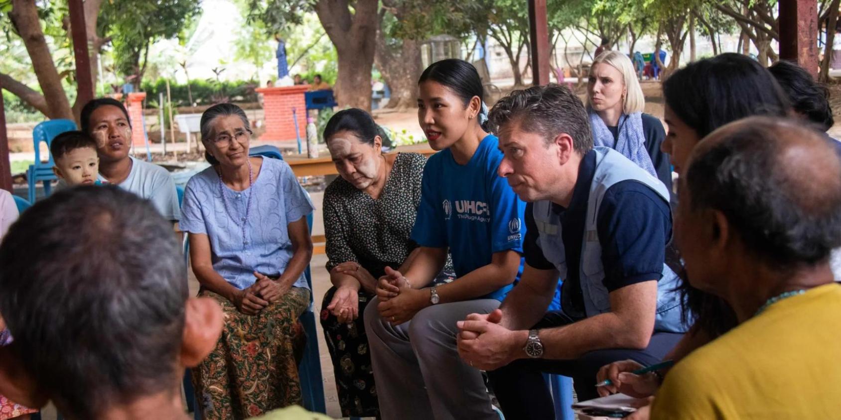 Tom Fletcher, UN Under-Secretary-General for Humanitarian Affairs and Emergency Relief Coordinator, listens to people affected communities during his visit to Mandalay, Myanmar.