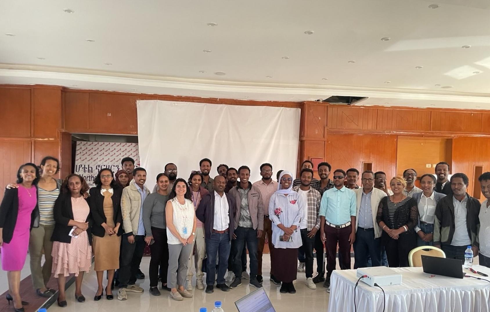 A group of young people gather