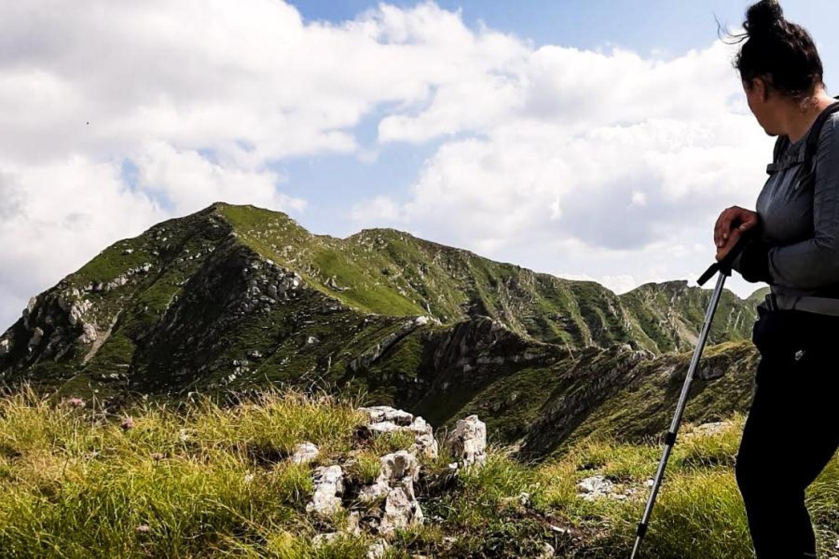 A woman on a mountain side 