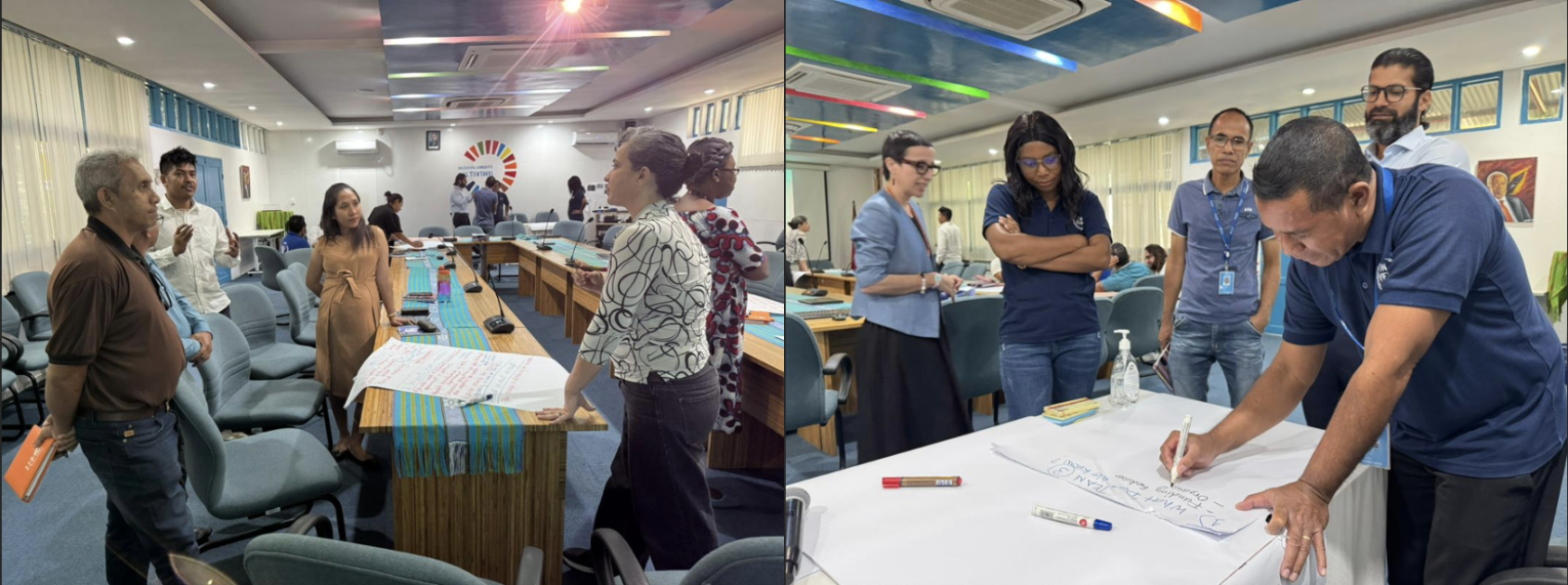 A group of people in discussion over a table