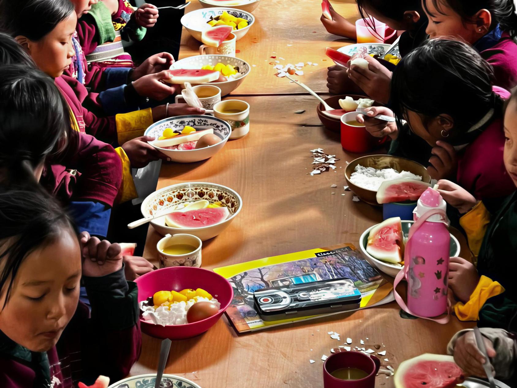Girls at a school in Bhutan eat their meal.