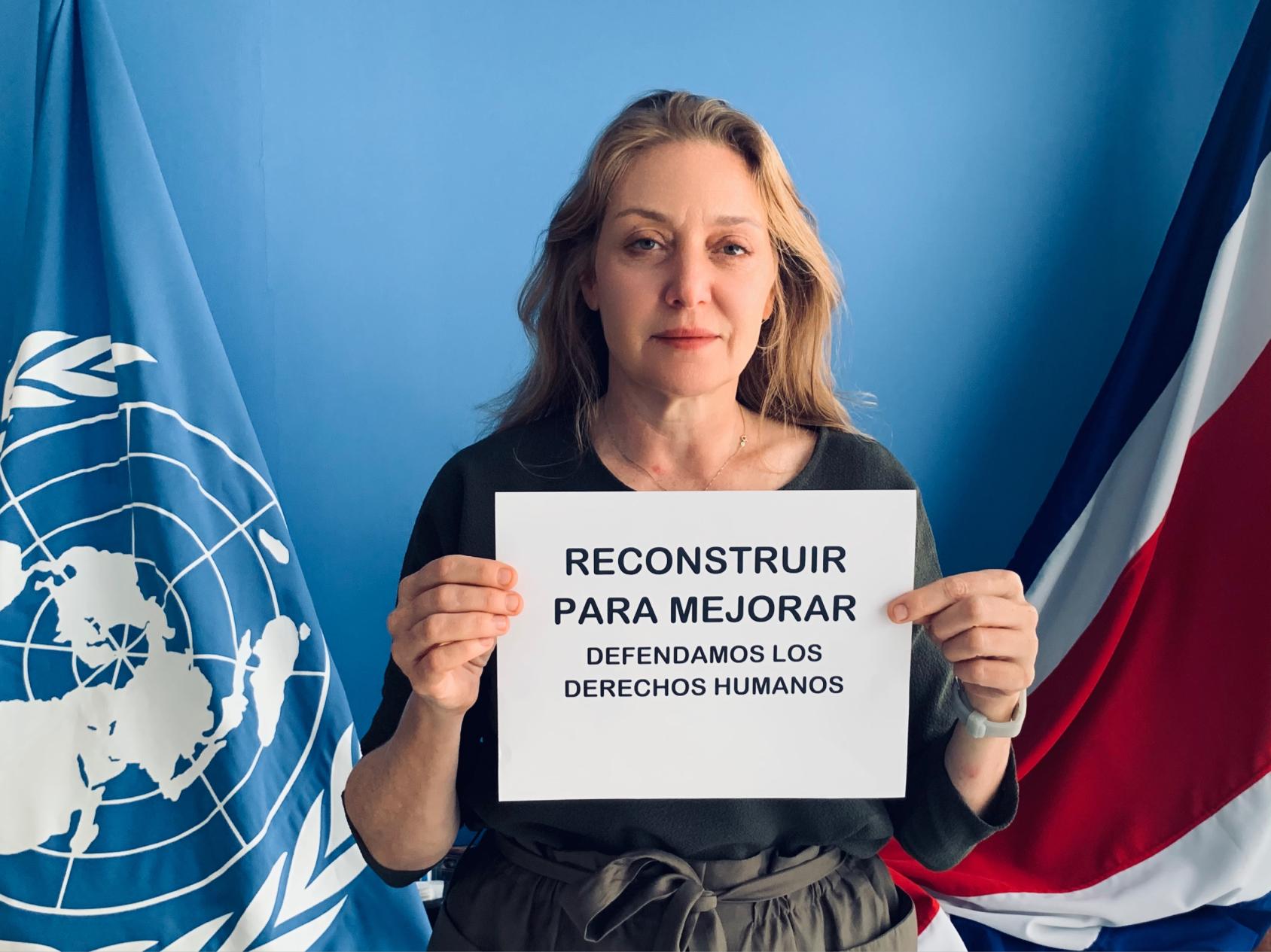 The Resident Coordinator in Costa Rica holds a paper advocating for better reconstruction.