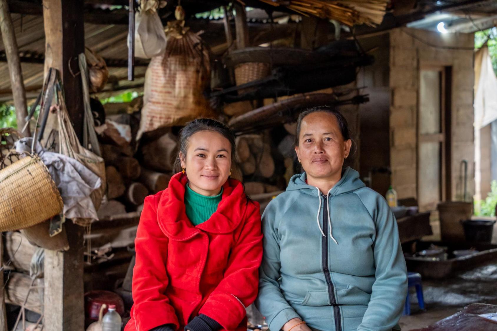 Two coffee bean farmers in Lao PDR.