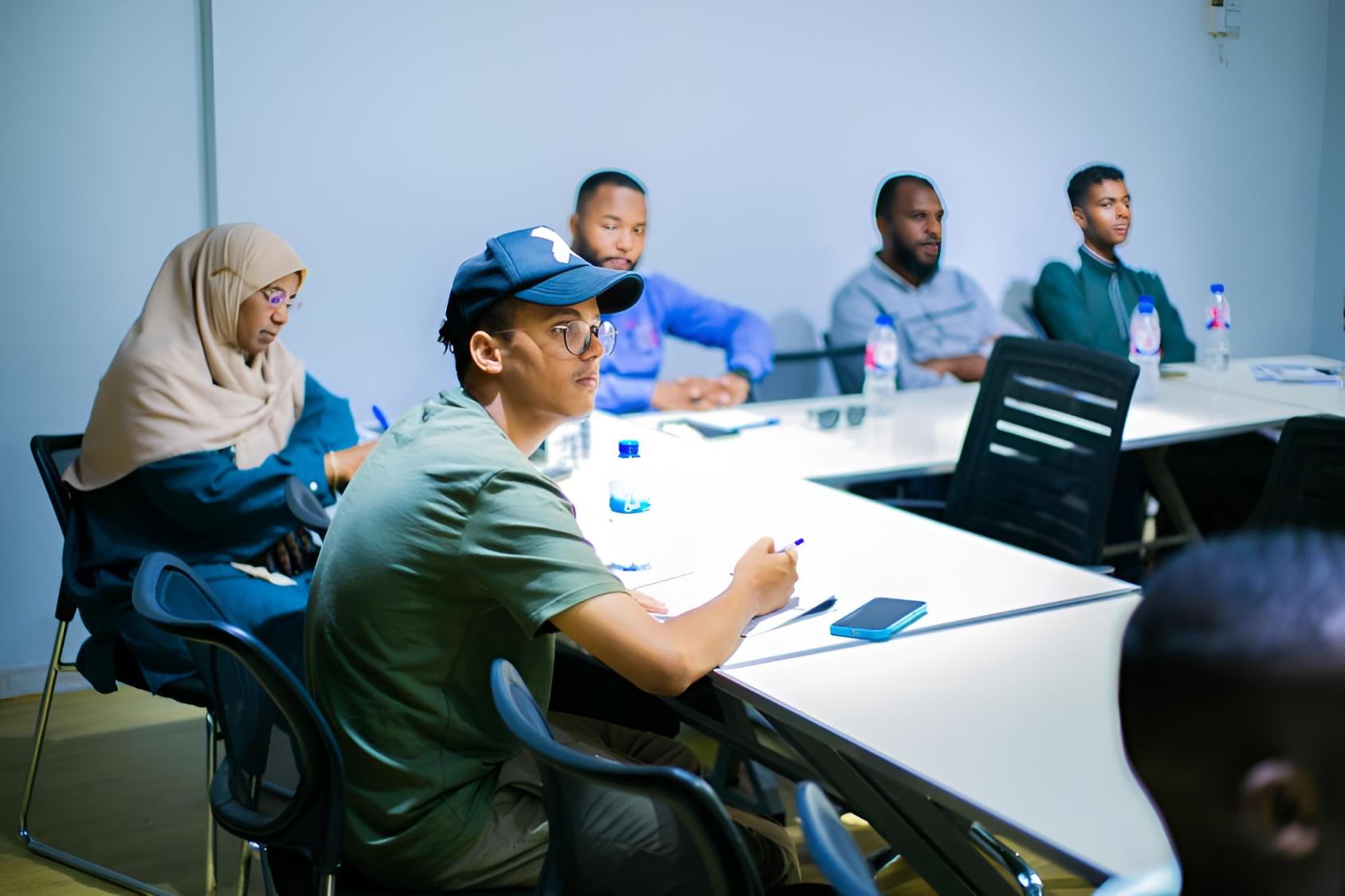 Young men and women in Libya participate in a vocational training workshop.