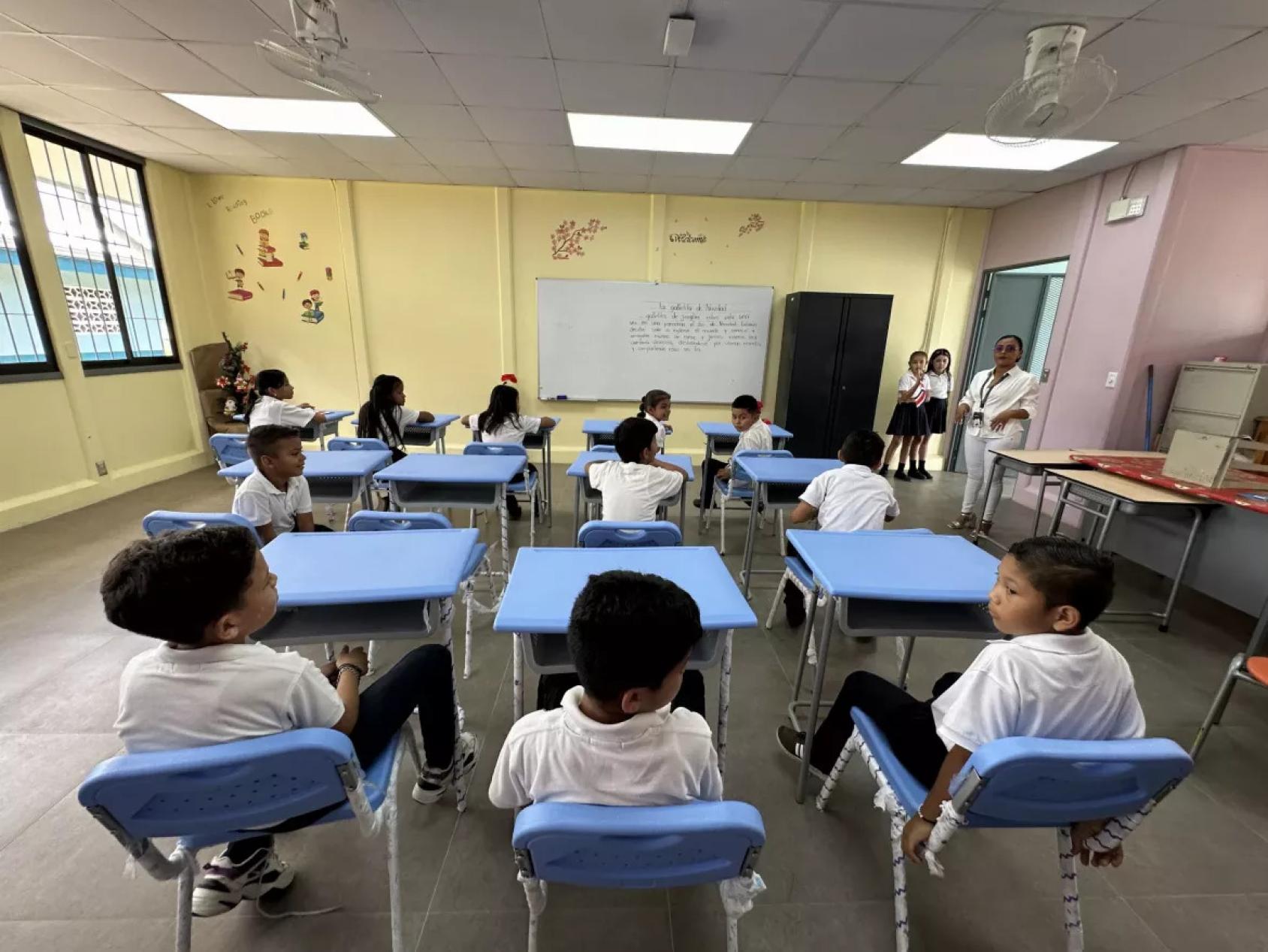 Students in Costa Rica sit in their classroom.