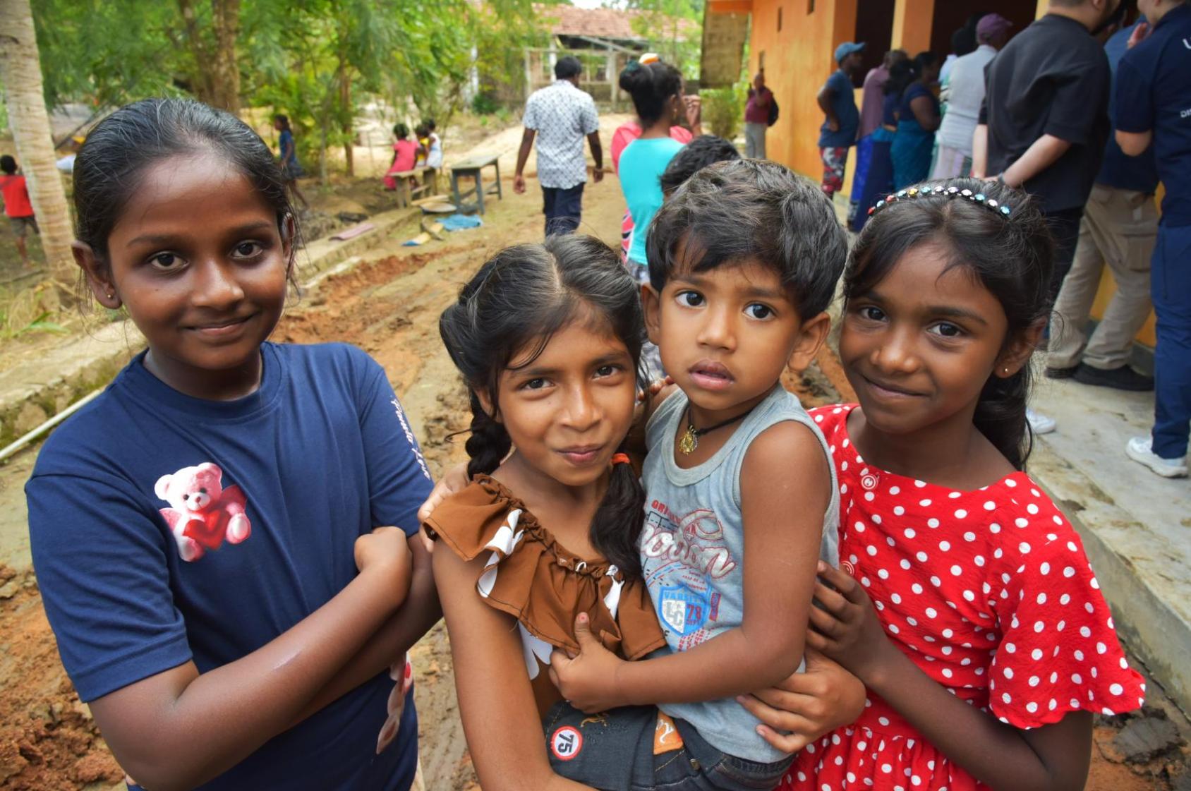 Four kids in Sri Lanka.
