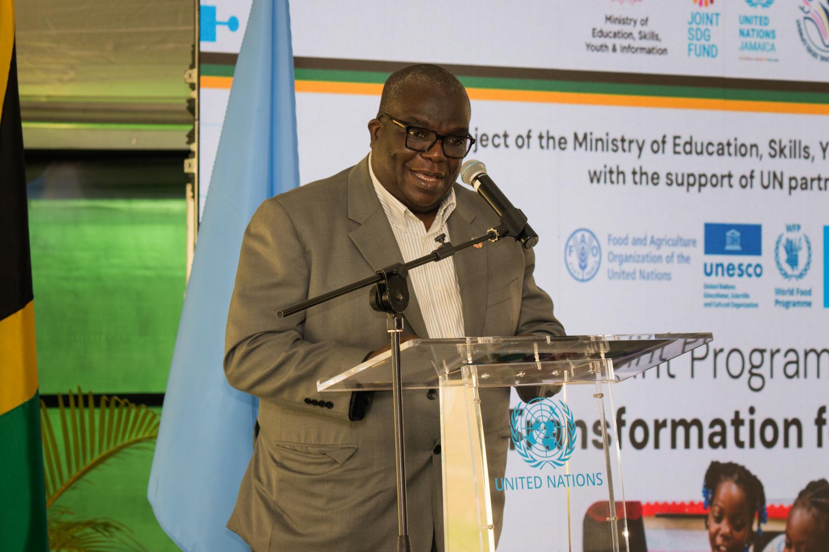 The UN Resident Coordinator in Jamaica delivers a speech.