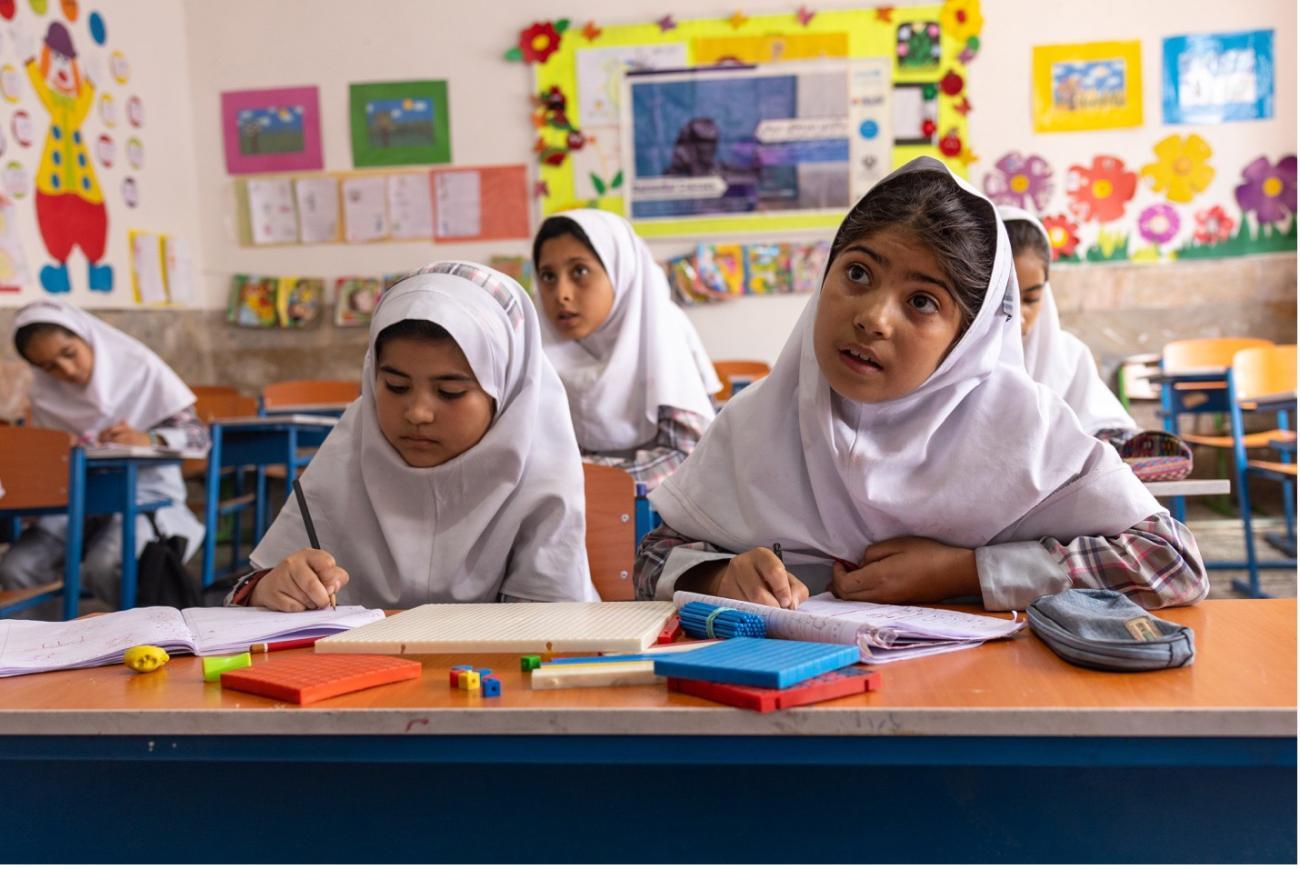 Afghan and Iranian children in a classroom