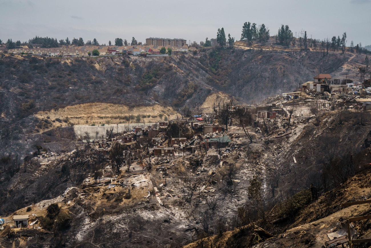 Aerial shots of torched ground from wildfires.