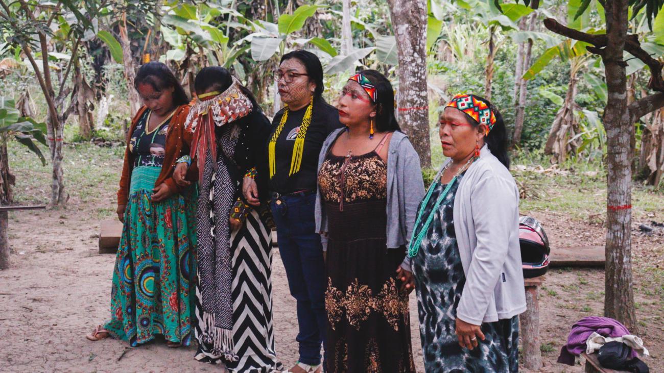 A group of indigenous women in Brazil wearing traditional clothes
