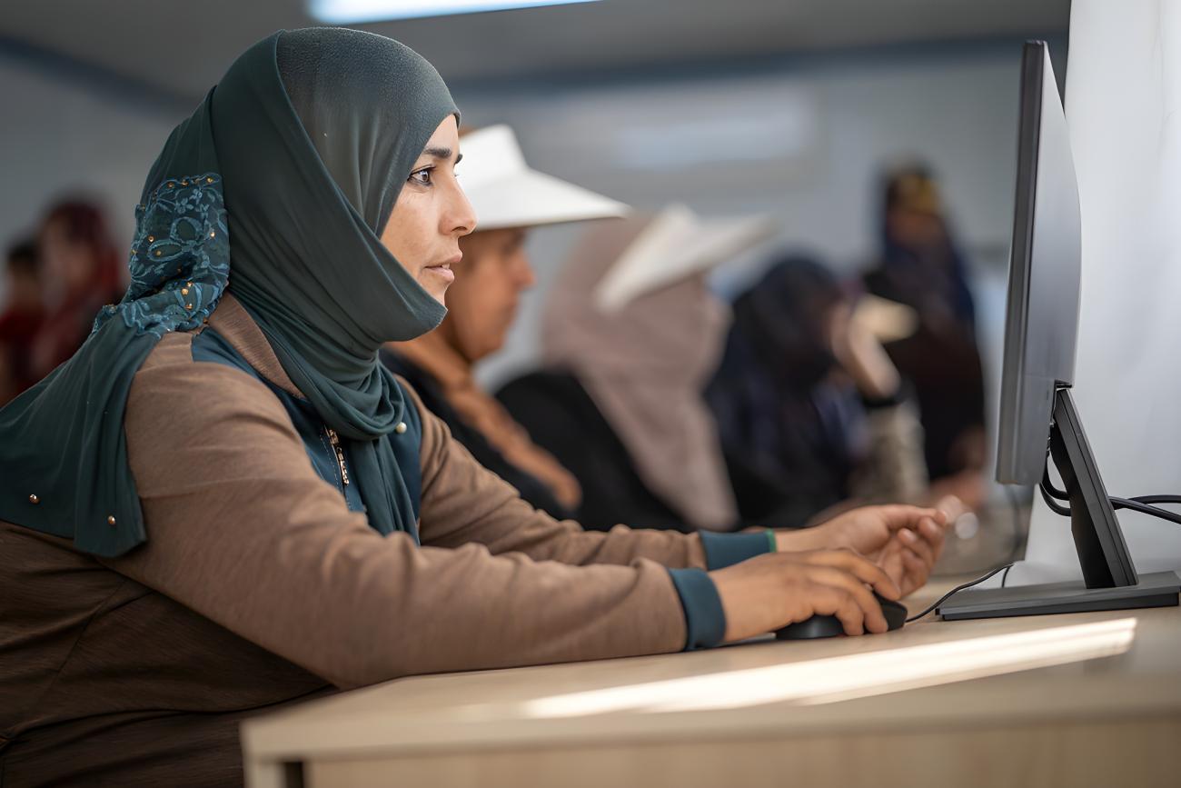 A woman in Jordan uses a computer.