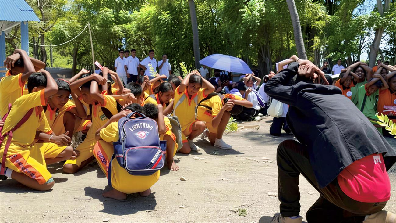 Students in Timor-Leste practice during a tsunami drill.