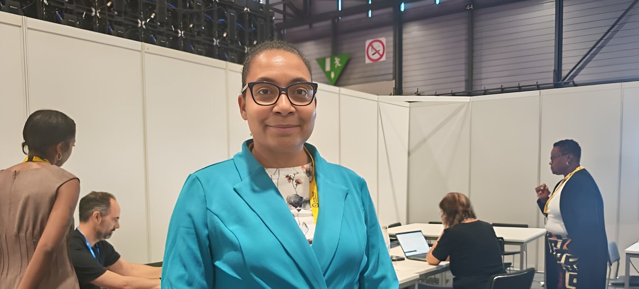 A woman engineer at a conference.