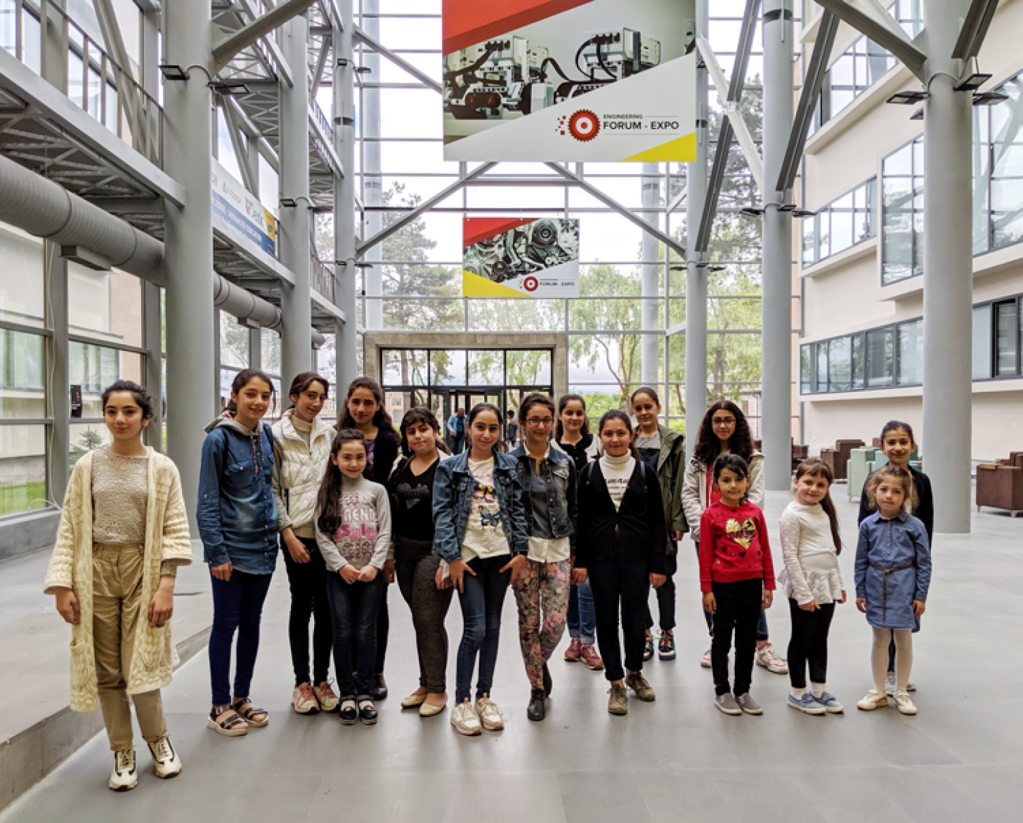 Girls standing side-by-side at the forum