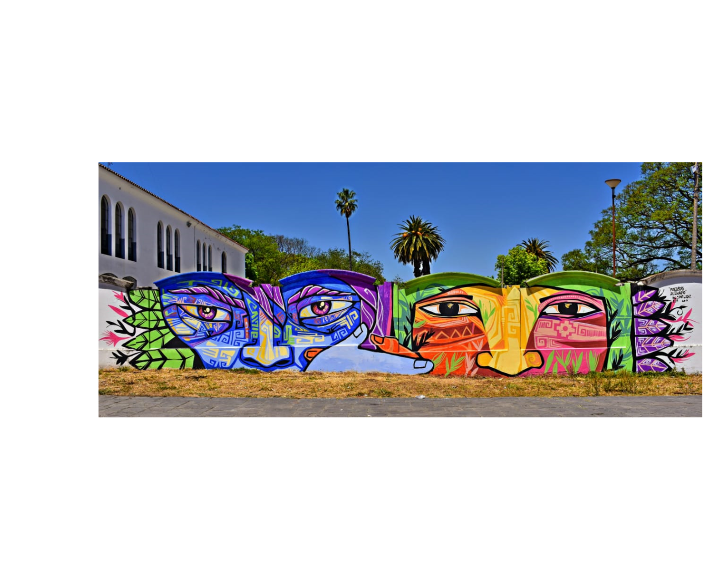 Three tiles display images of young people happily smiling in front of their mural; the second shows a brightly coloured mural of two faces, and the third, a young man walking passed a beautifully vivid mural or two people.